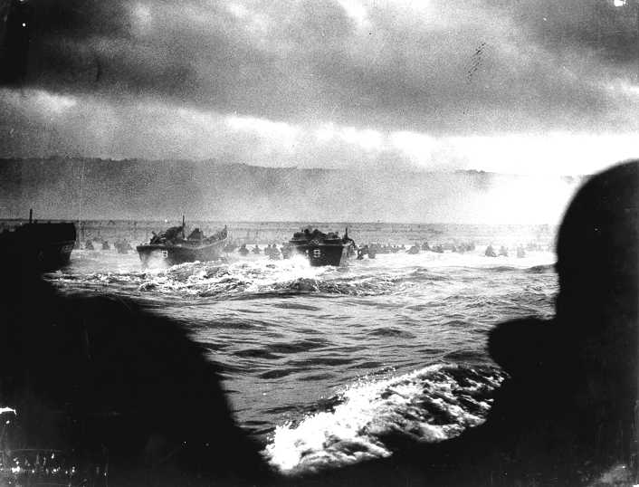Omaha Beach: LCVPs from the Samuel Chase approach under fire.